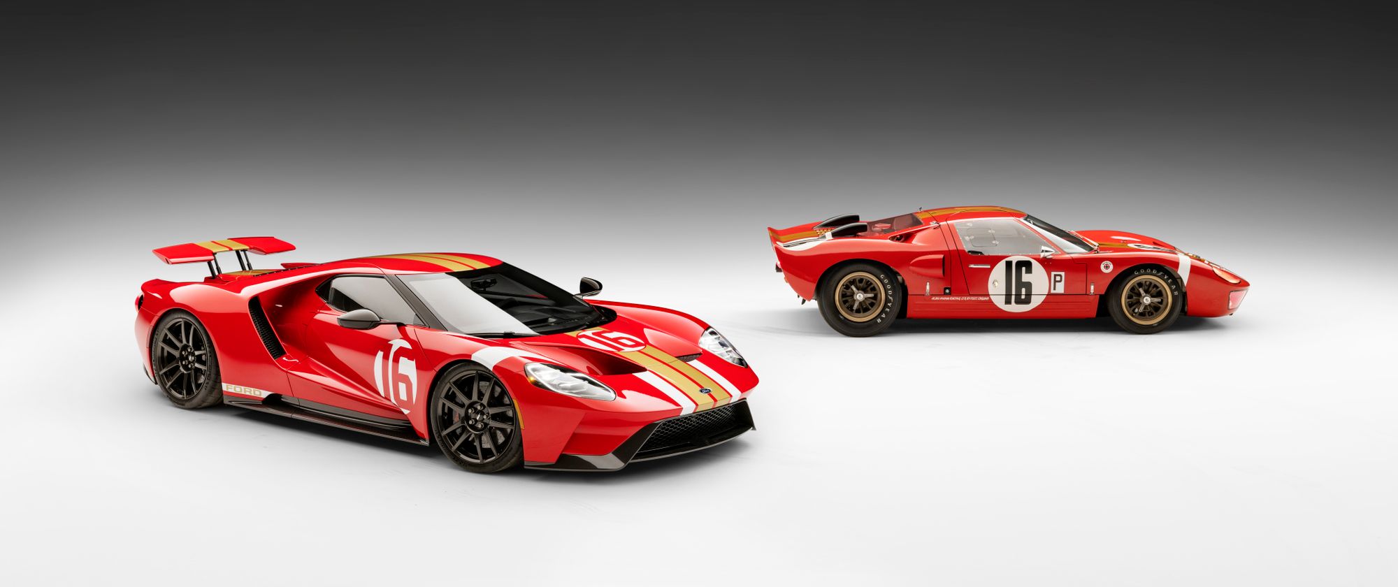 red 2022 alan mann edition ford gt with heritage car behind it