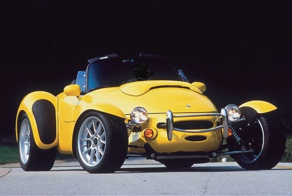 yellow Panoz AIV Roadster front three quarter view